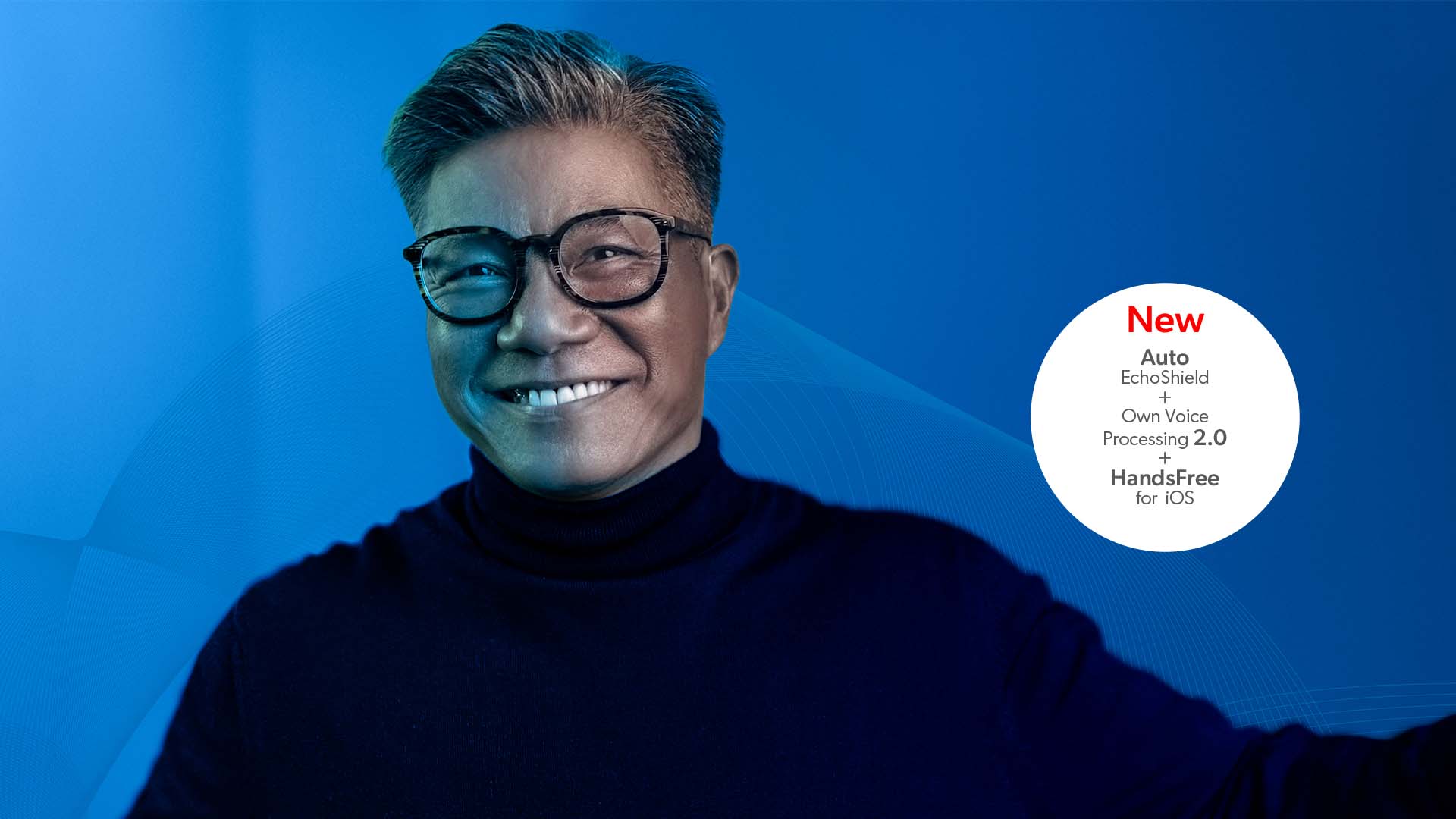 Man smiling and wearing Pure Charge&Go AX hearing aids - new Signia AX features